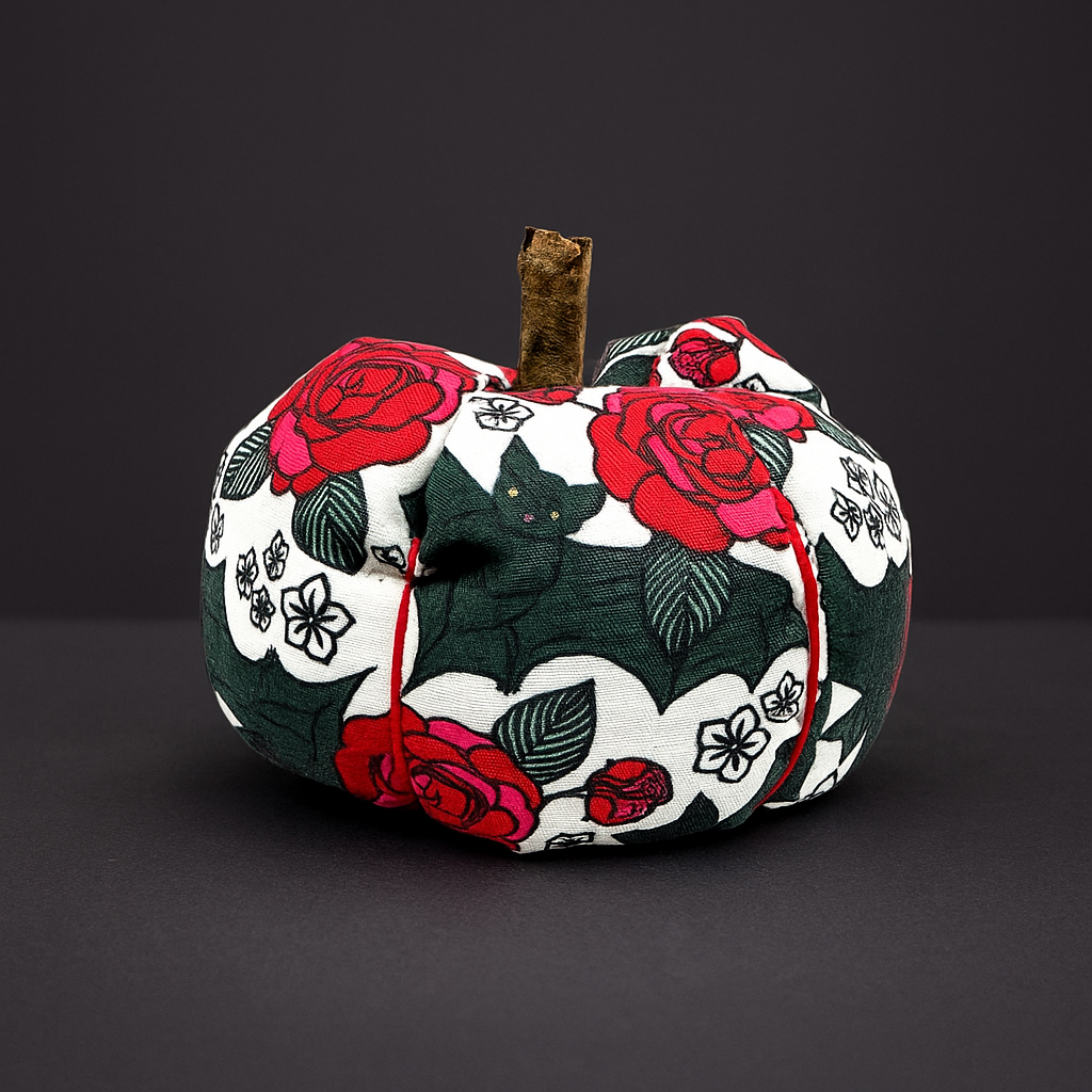 Decorative fabric pumpkin with floral and bat pattern