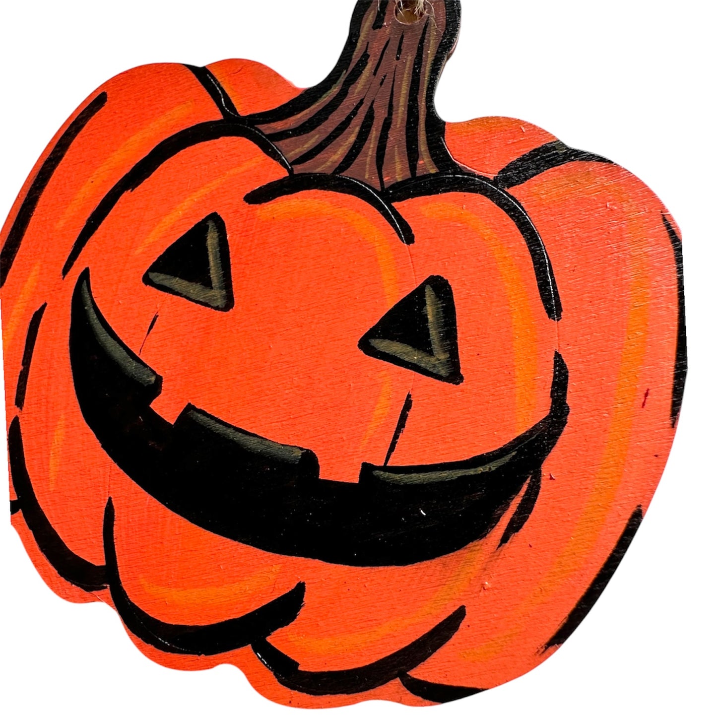 Wooden pumpkin decoration with a carved style painted face