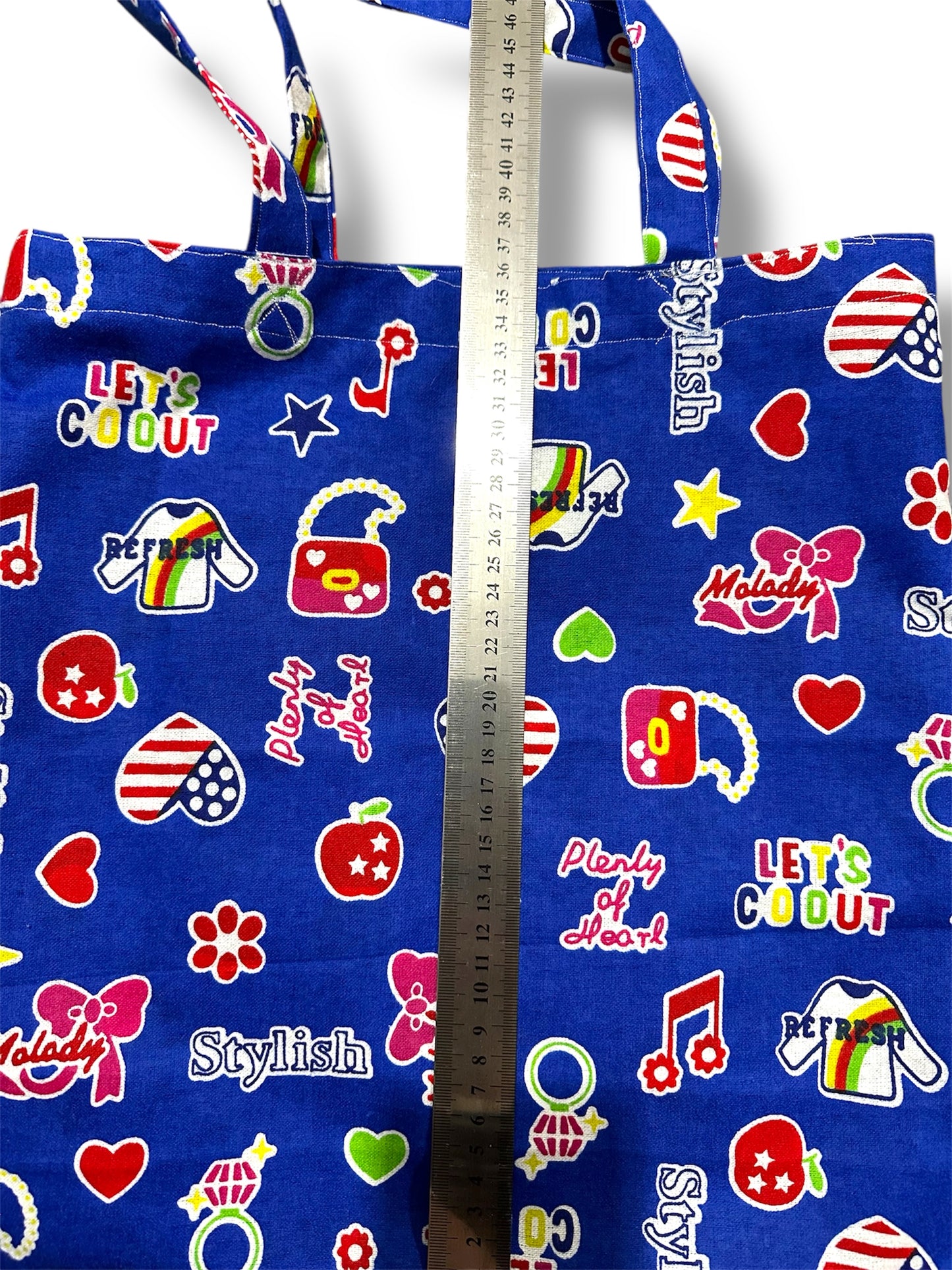 Handmade tote/shopping bag. Retro fun fabric.