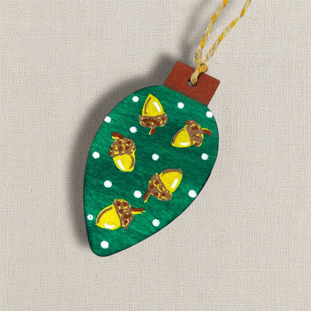 Decorative wooden ornament with hand painted acorn designs 