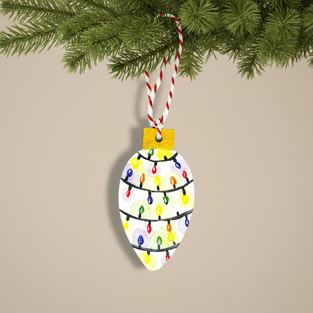 Decorative Christmas ornament shaped like a Christmas tree light bulb with colourful hand painted lights on a white background 