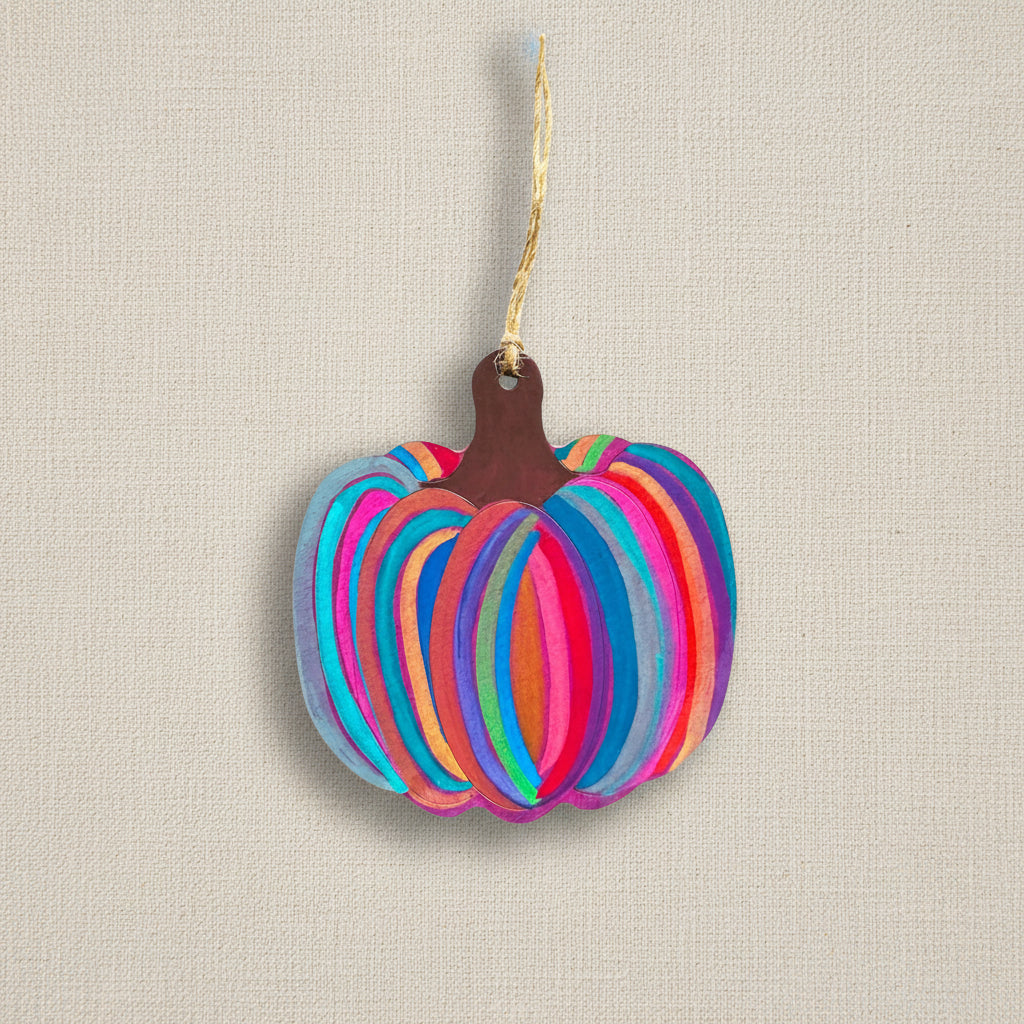 Colourful wooden pumpkin-shaped ornament with a brown stem