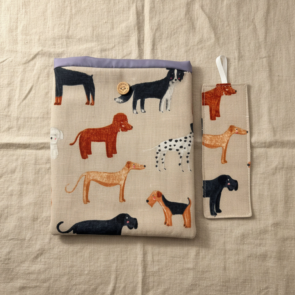 Matching fabric kindle cover and bookmark with dog themed fabric 