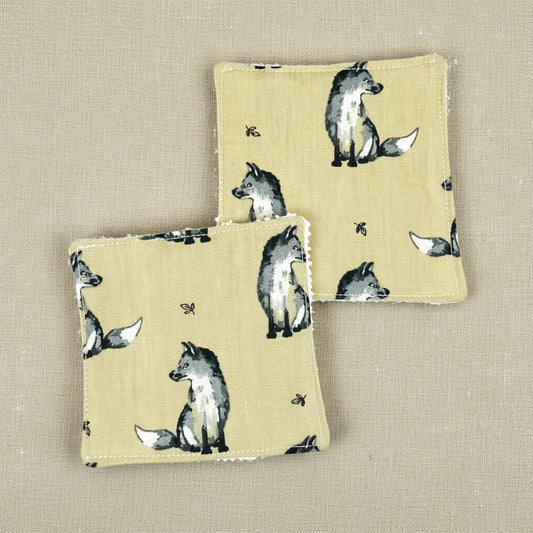 Two square fox themed reusable face wipes showing fox side (fabric)
