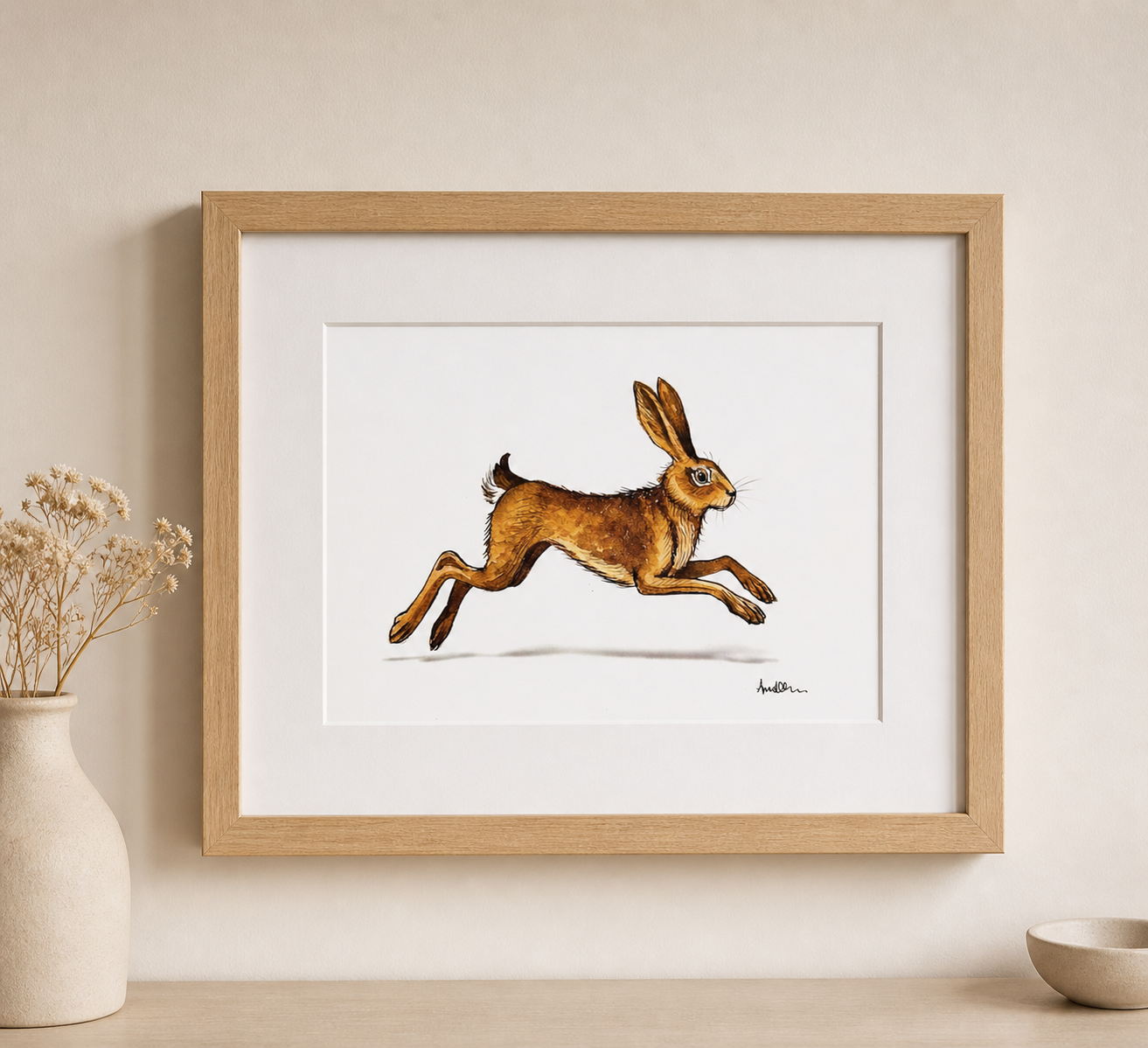 Running hare illustration on white background. Shown mounted and framed 