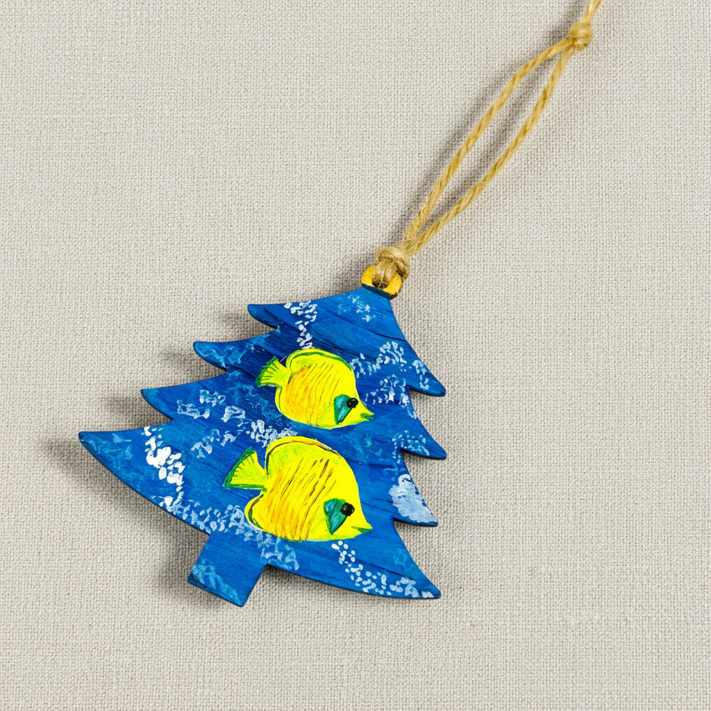 Decorative ornament shaped like a blue Christmas tree with yellow fish