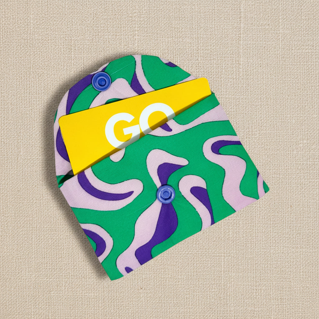 Colourful card wallet shown open with a store card inside 