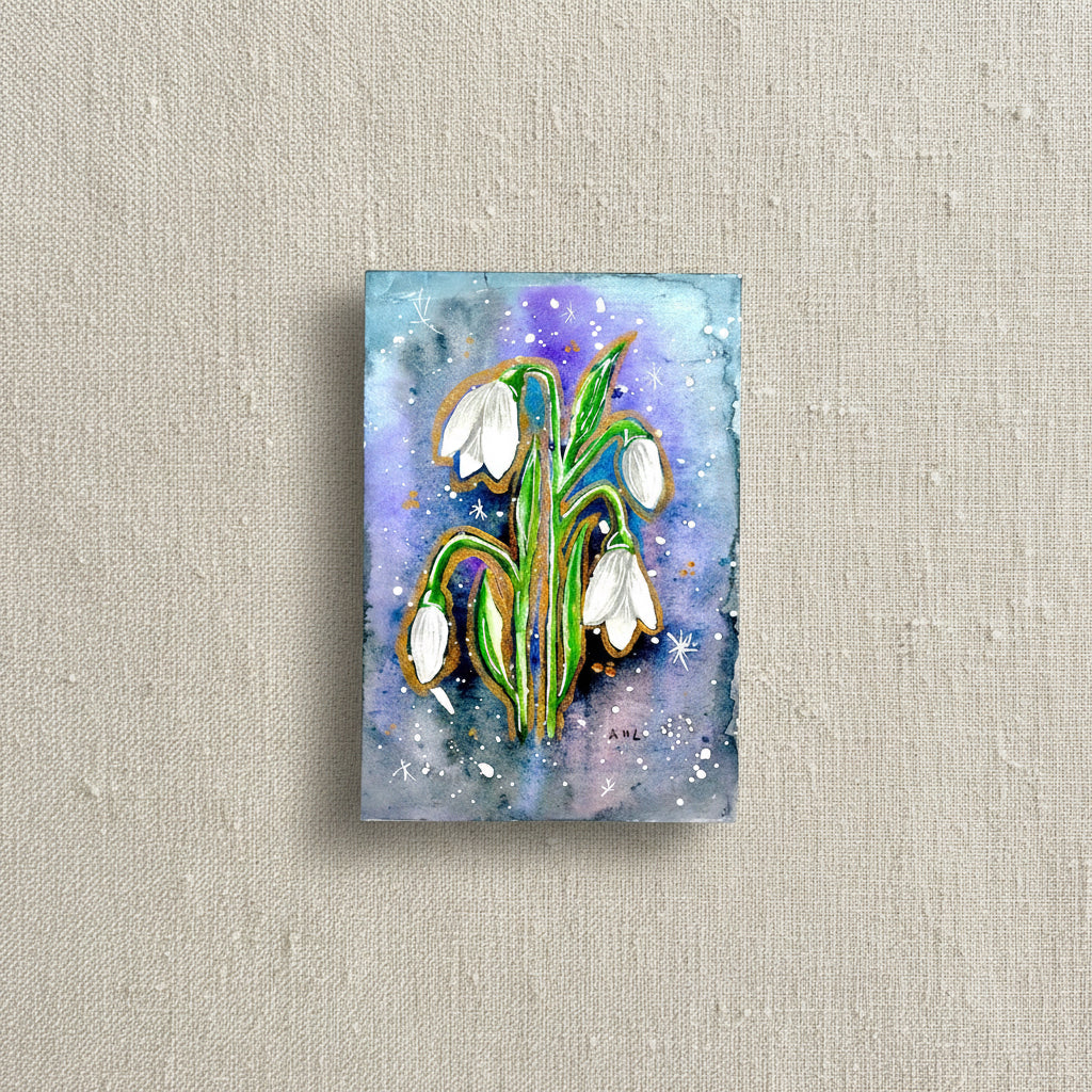 Artistic depiction of snowdrop flowers with a watercolor background