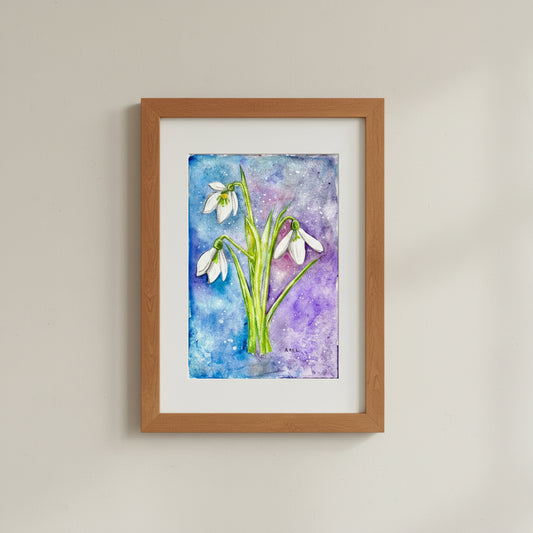 Artistic depiction of snowdrops on a watercolor background
