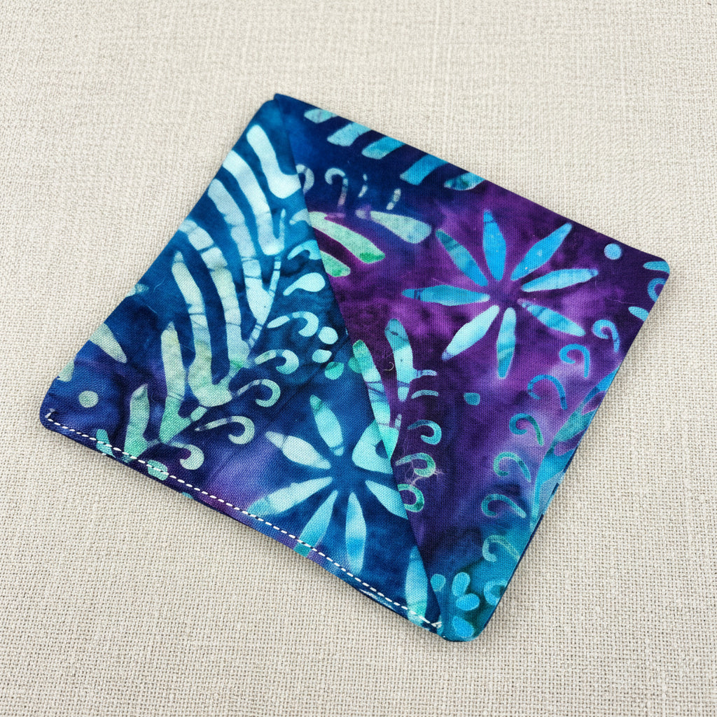 Colourful fabric corner bookmark with floral pattern