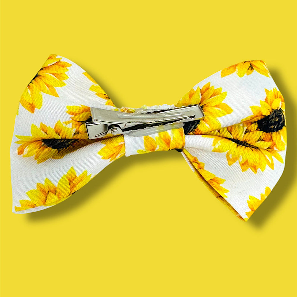 Handmade sunflower hair bow.